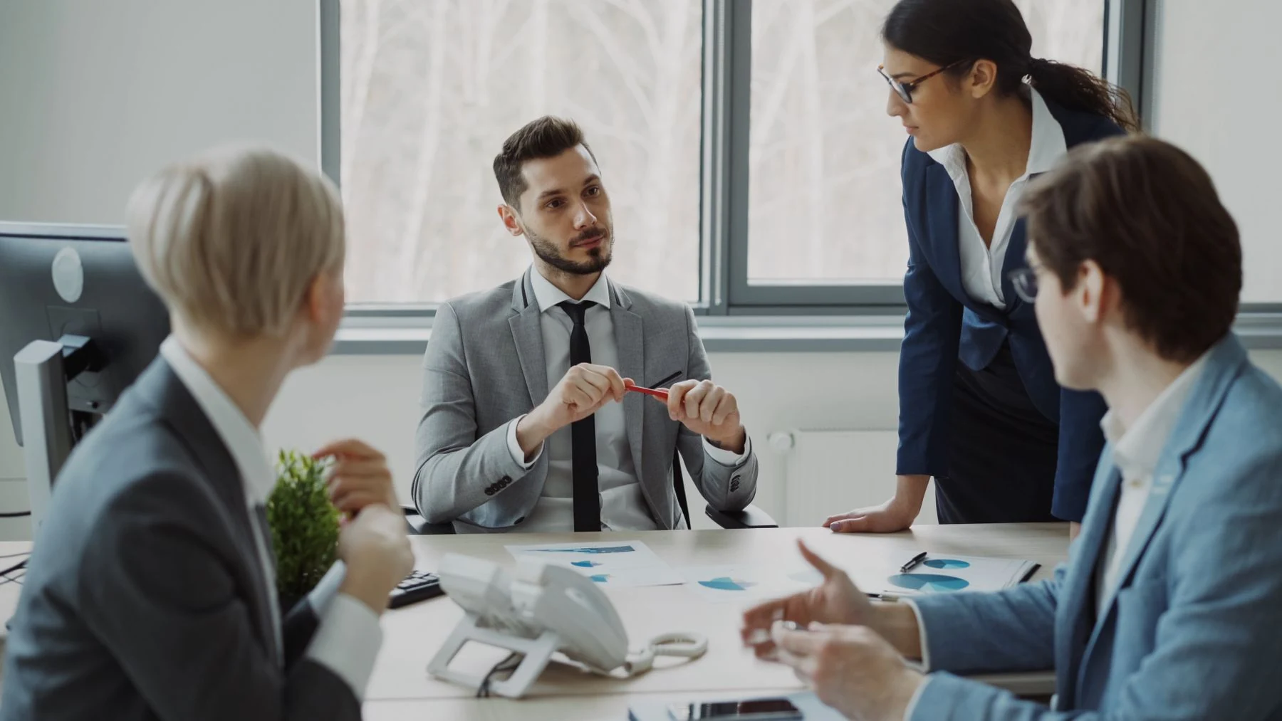 Professionals collaborating in a modern office